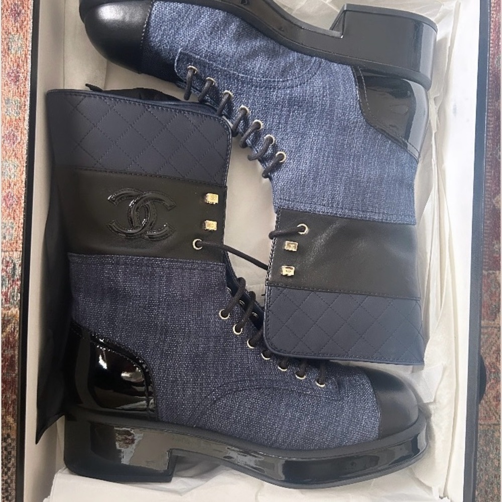 Chanel denim and leather combat boots.